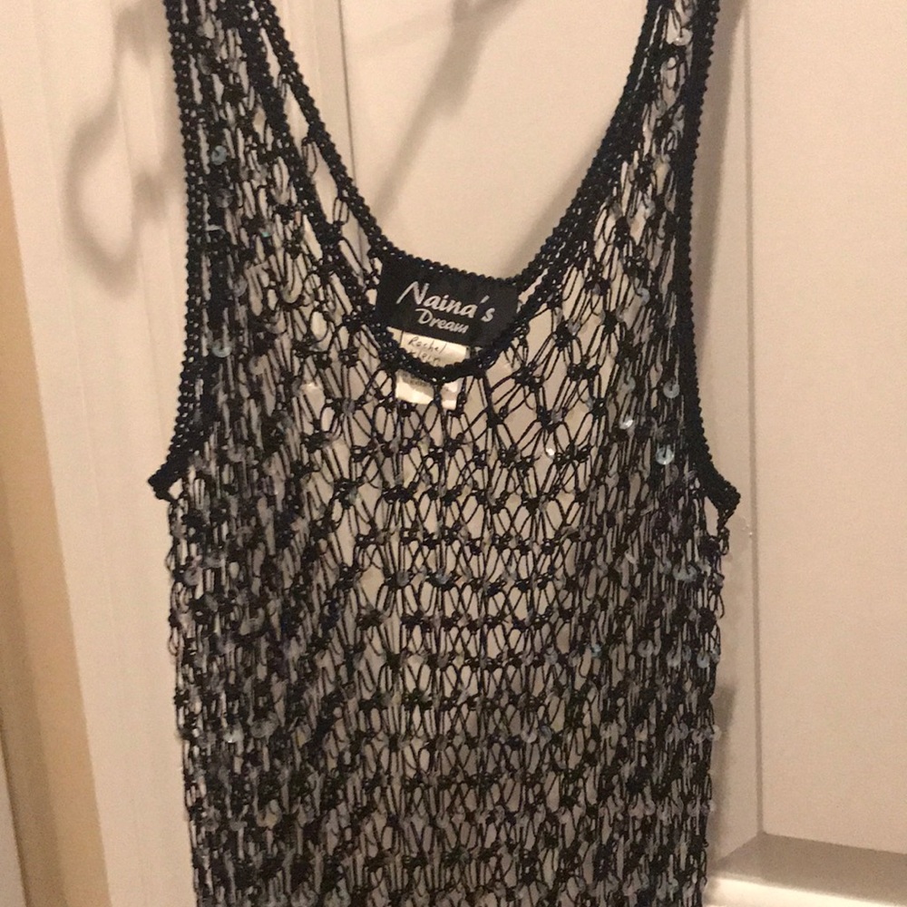 Tank with sequins.